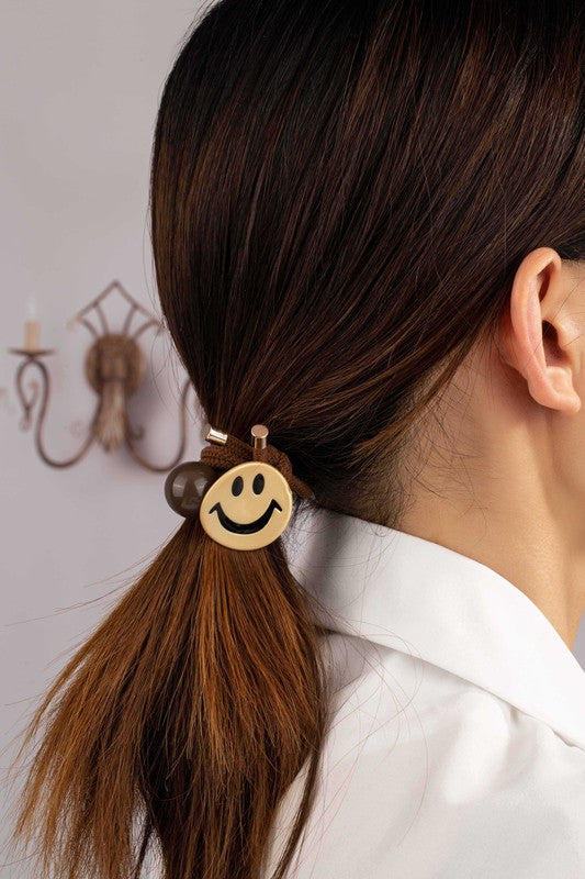 Smiley face hair elastic tie with a grey bead