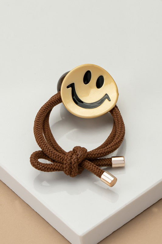 Smiley face hair elastic tie with a grey bead